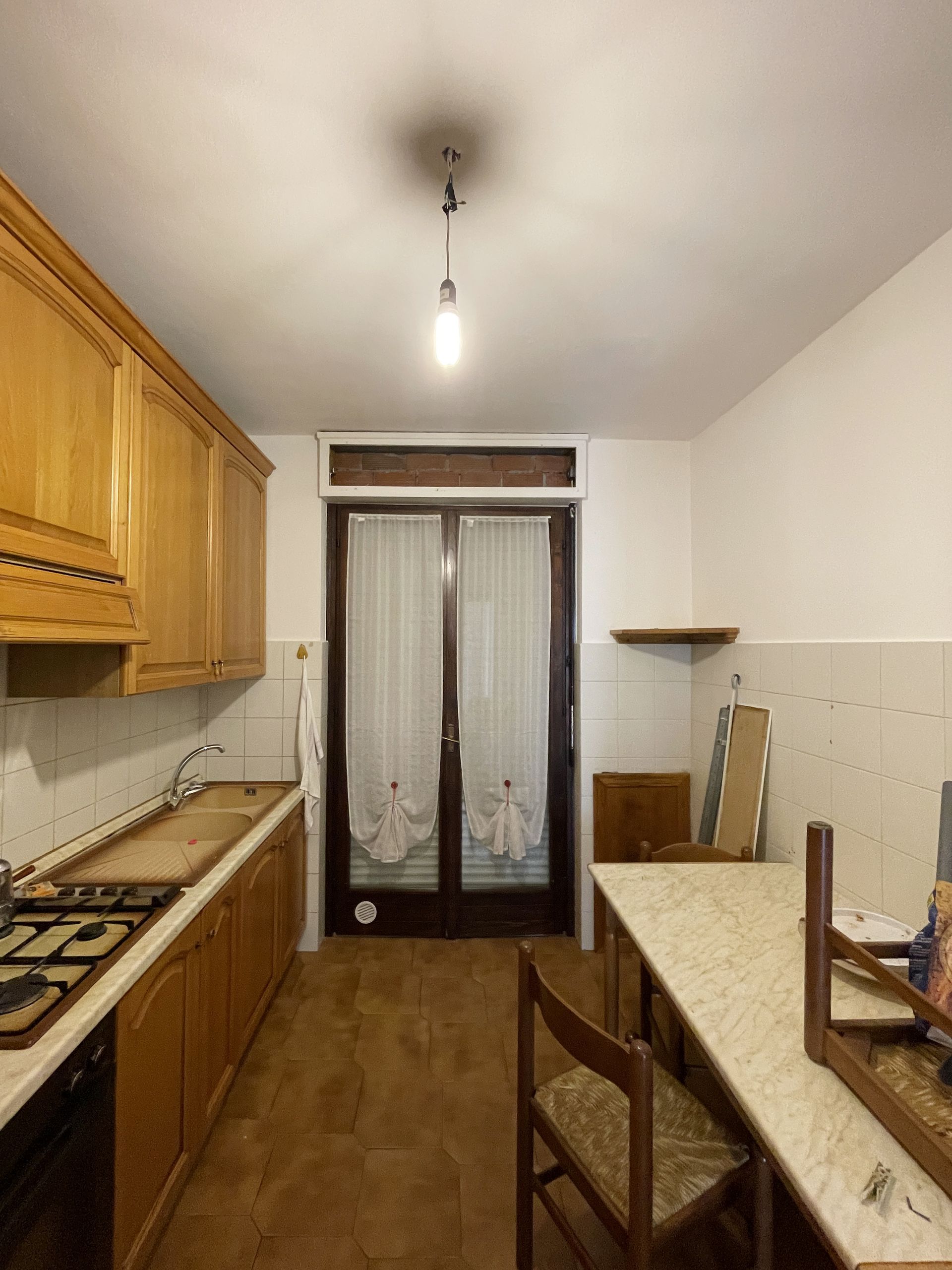 Progetto interior design, ristrutturazione appartamento, corpo scala, open space, isola cucina, Bergamo, Milano, Lago di Como, Londra, New York, Parigi, Gstaad