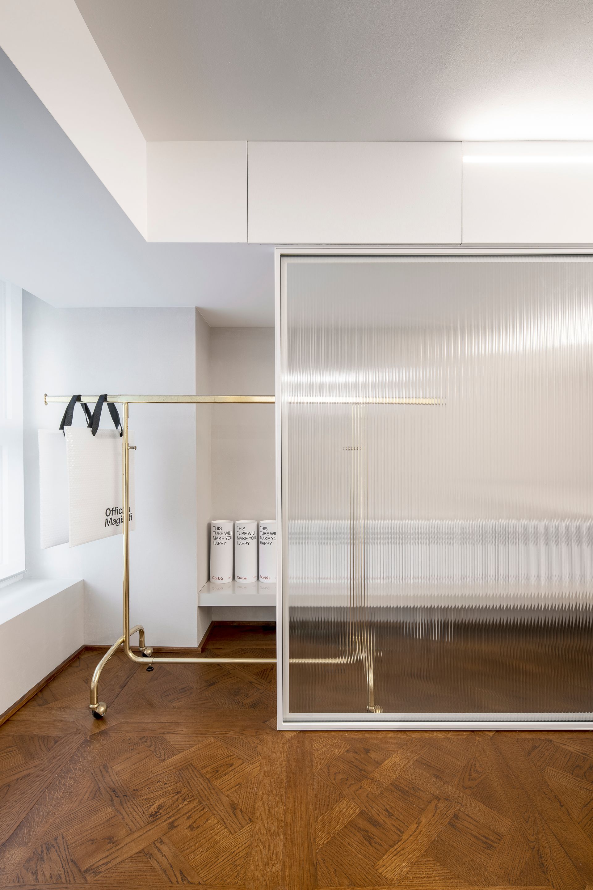 Interior design project, boutique remodeling and rebranding luxury fashion clothing Bergamo, Milan, Lake Como, London, New York, Paris. Officina Magisafi architecture design -  office glass