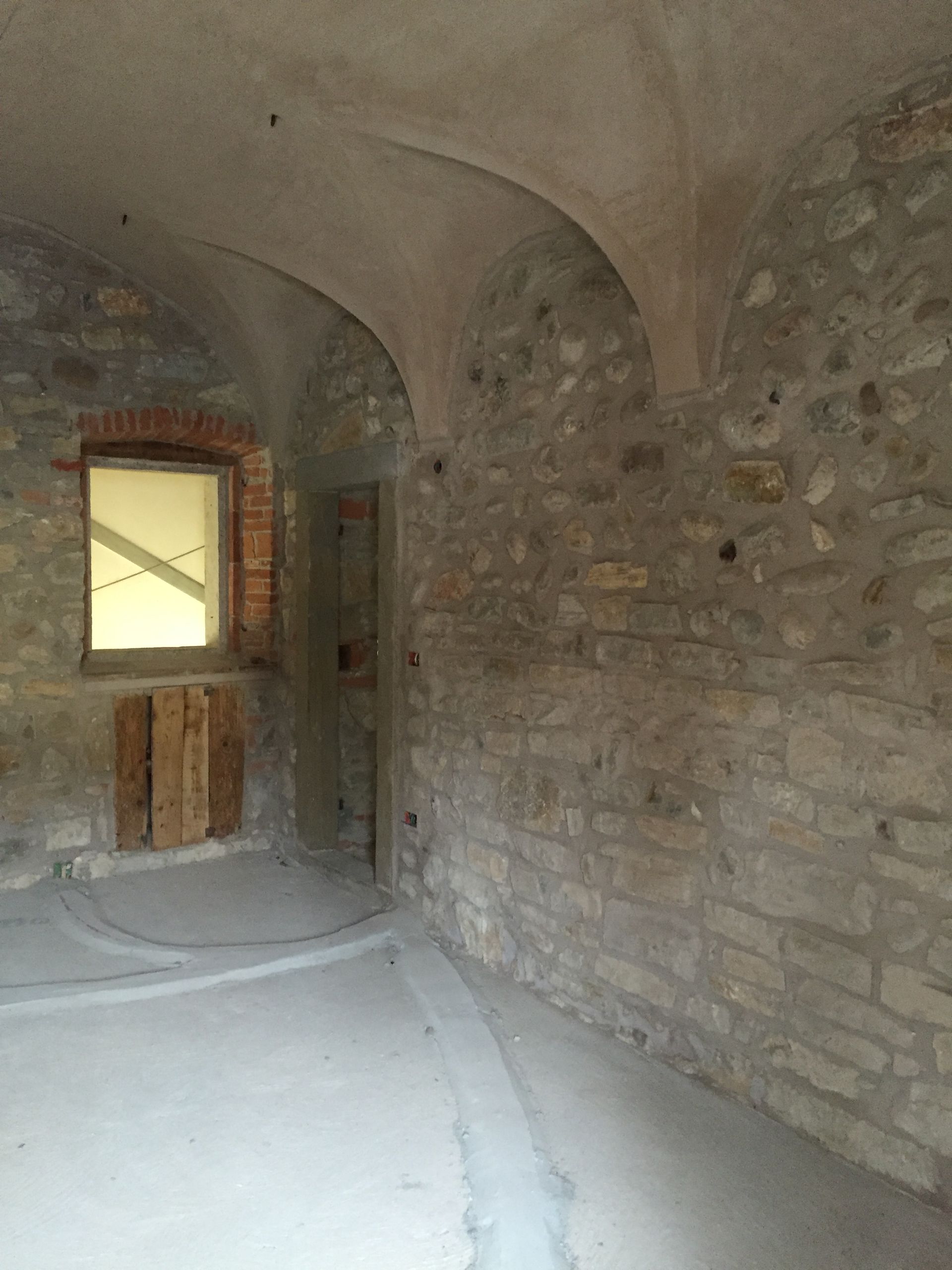 Interior design project, old apartment renovation exposed bricks, arches, cave. Officina Magisafi architecture design - construction site