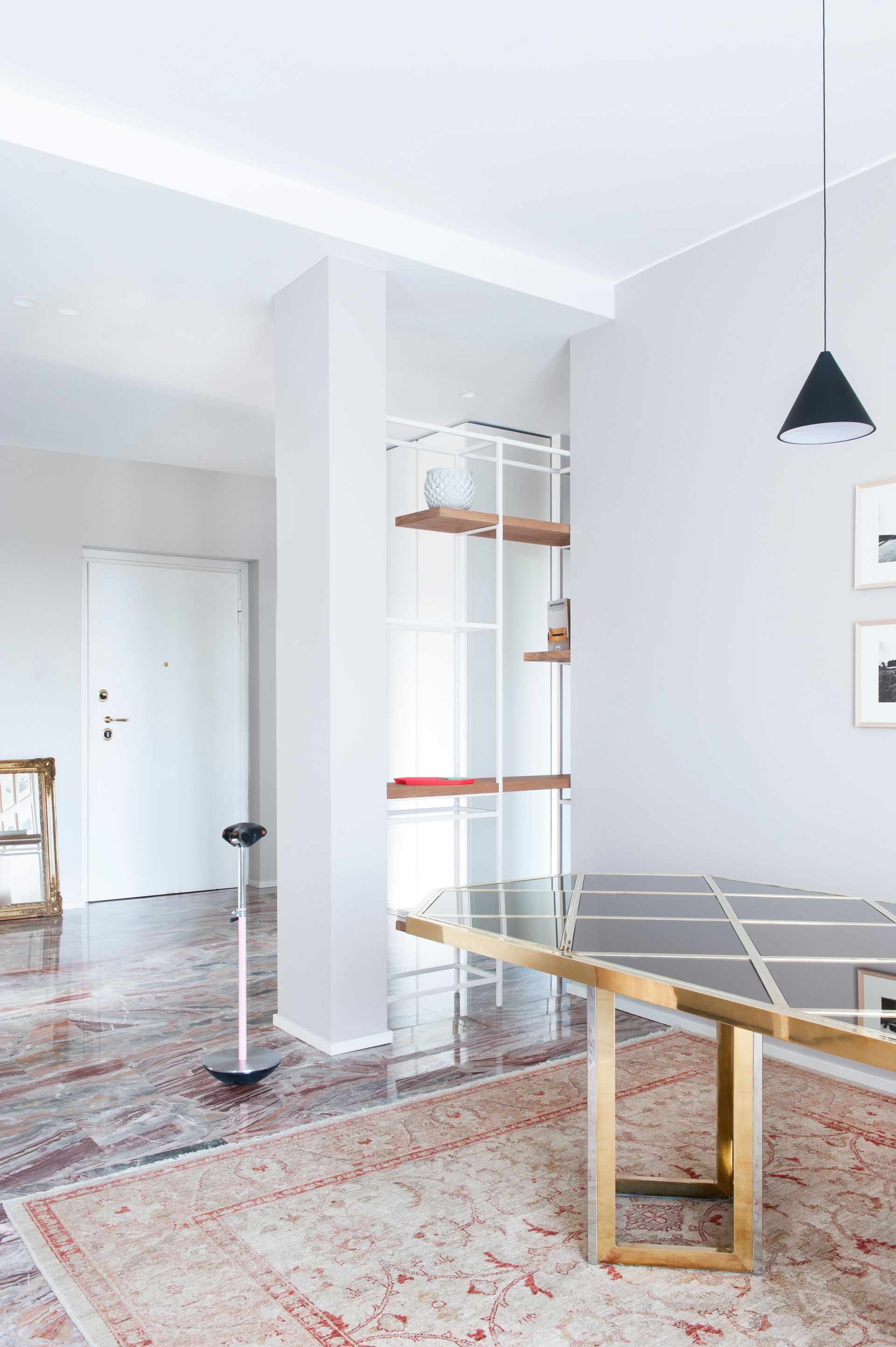 interior design project, luxury apartment renovation in the center of Bergamo, arabescato orobico marble, custom made bookcase, pieces of design - entrance